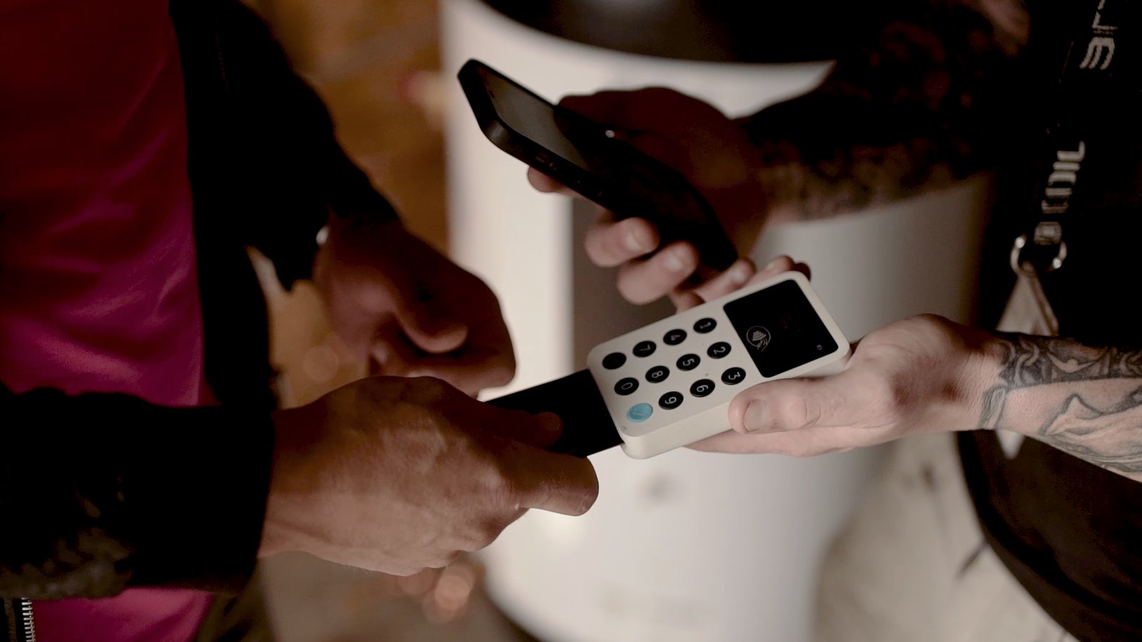 Customer paying a tradesperson by card